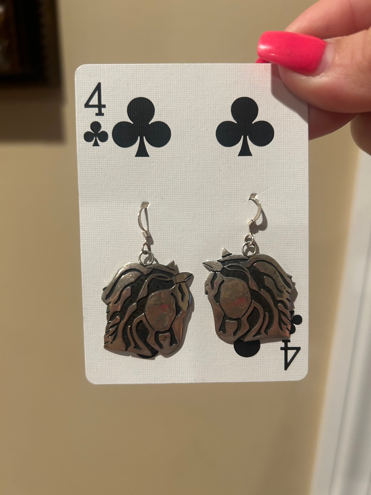 Native made horse head earrings