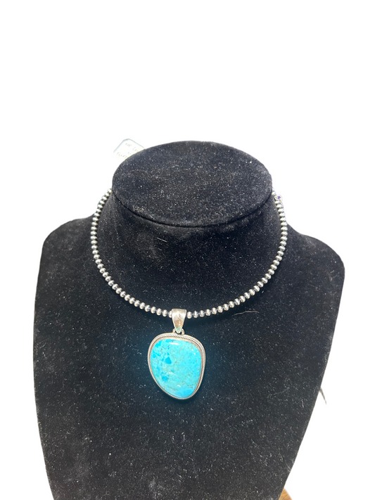 Native pearl 2mm chocker paired with a turquoise pendant