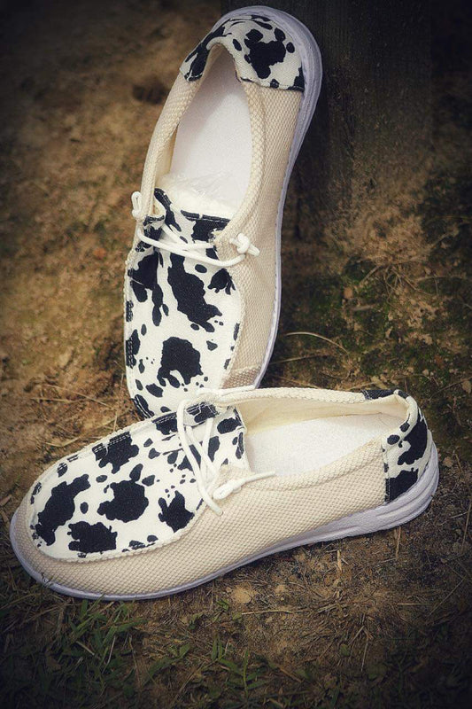 Cow print mesh boat shoes