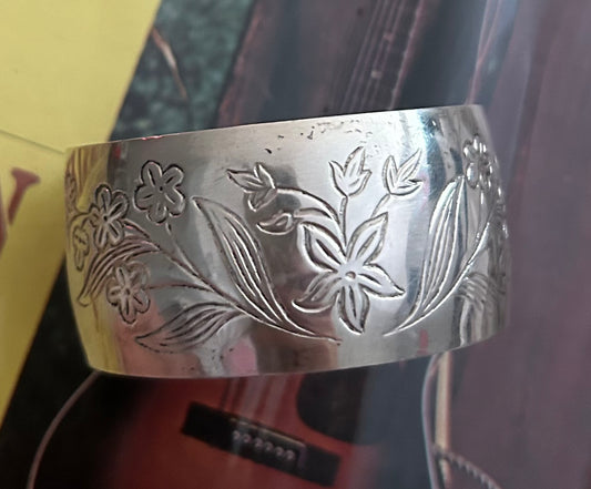 Vintage floral stamped sterling silver cuff