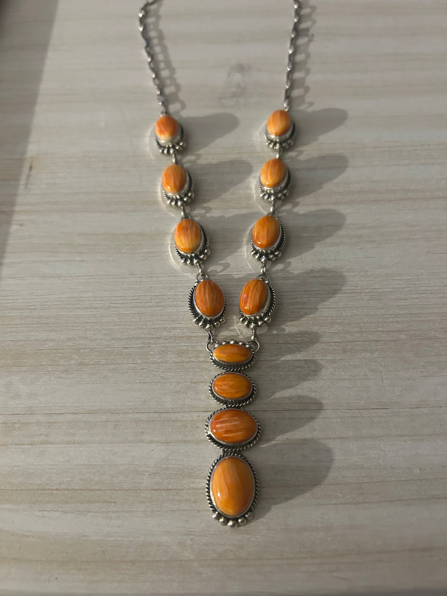 Orange spiny oyster 12 stone lariat necklace